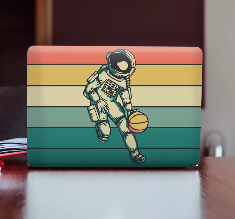 Adesivo para laptop astronauta jogando bola - TenStickers