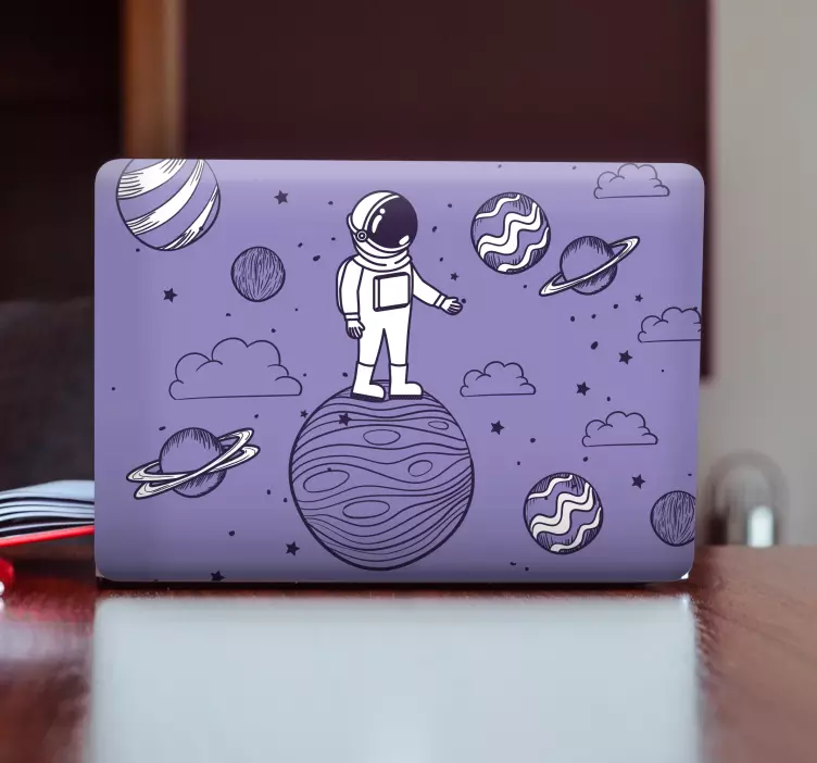 Adesivo para laptop astronauta no planeta - TenStickers
