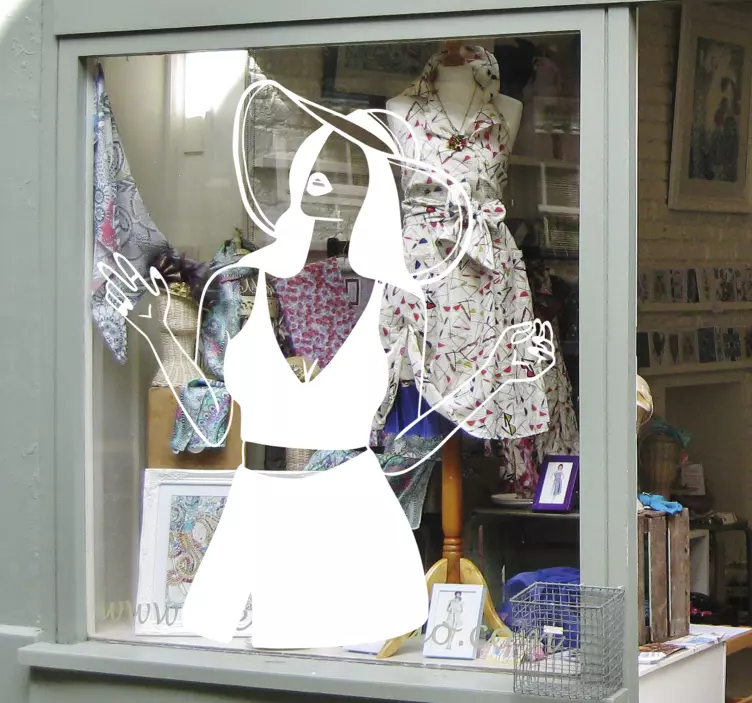 Adesivo para montras silhueta de mulher estilosa - TenStickers