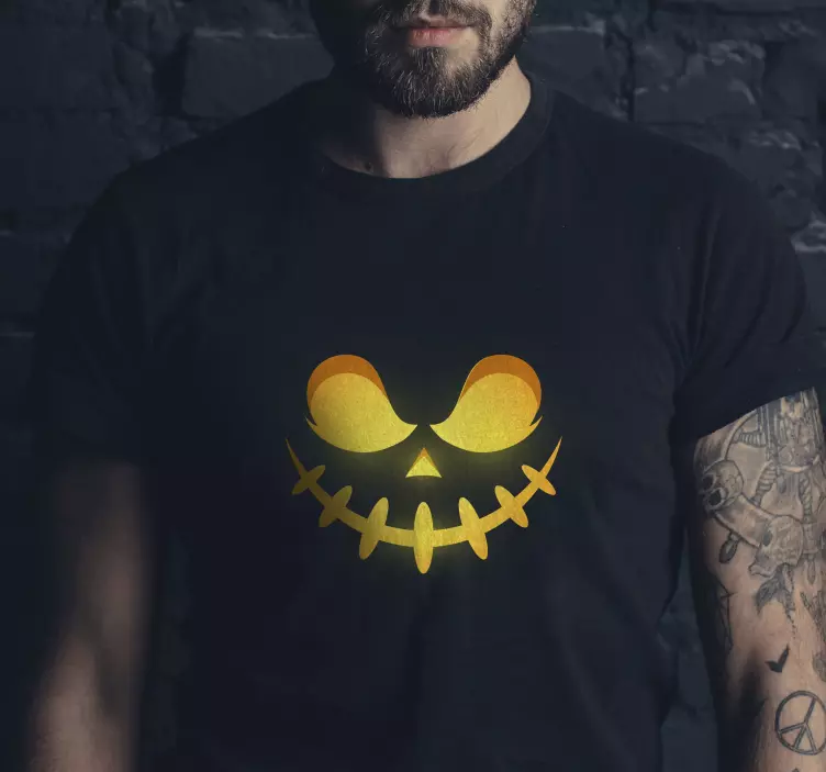 T-shirtde halloween com cara de abóbora brilhante - TenStickers